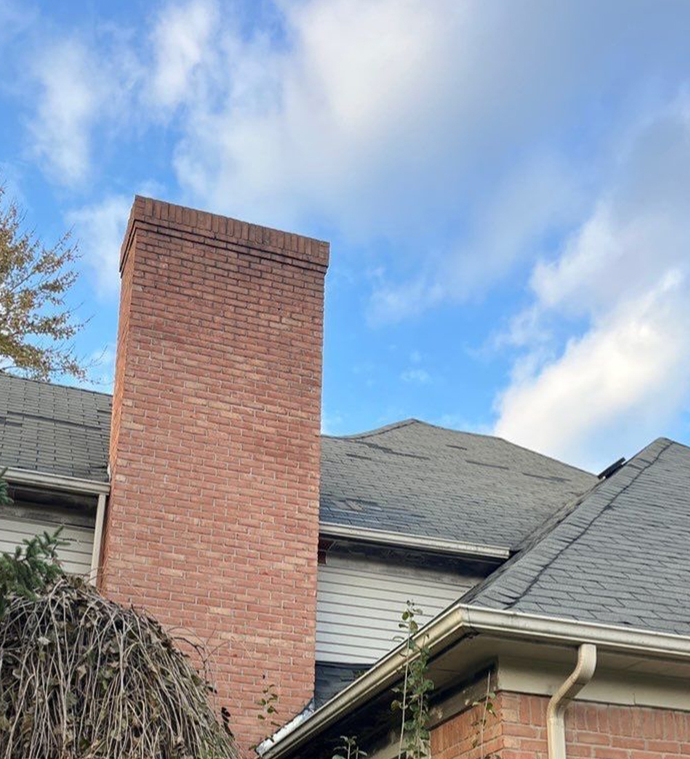 roof of a house that needed roof repair service with Windblown Shingles
