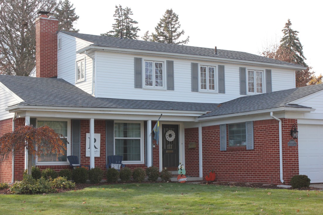 two-story house received roof repair service from Renaissance Roofing